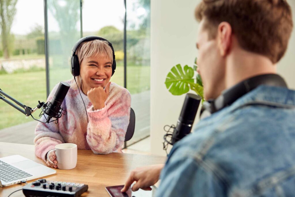 couple-recording-podcast-or-broadcasting-interview-AMTYM5C.jpg